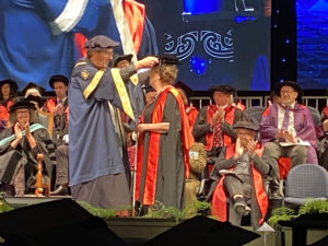 Dr Pam getting capped by the Massey University Chancellor in December 2024